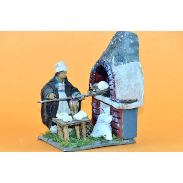 Fornaio con forno di terracotta