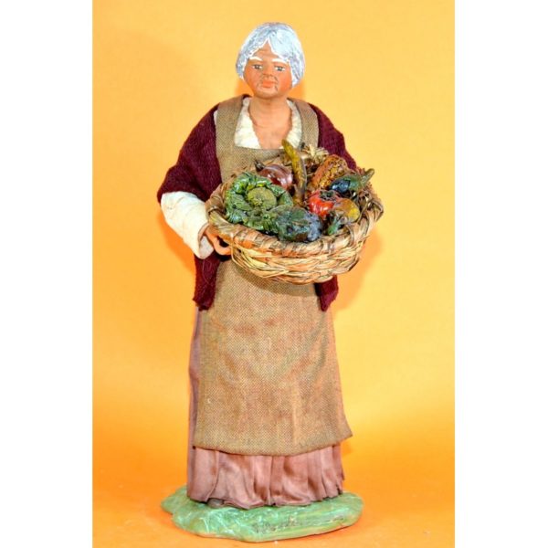 Donna con cesto frutta antica